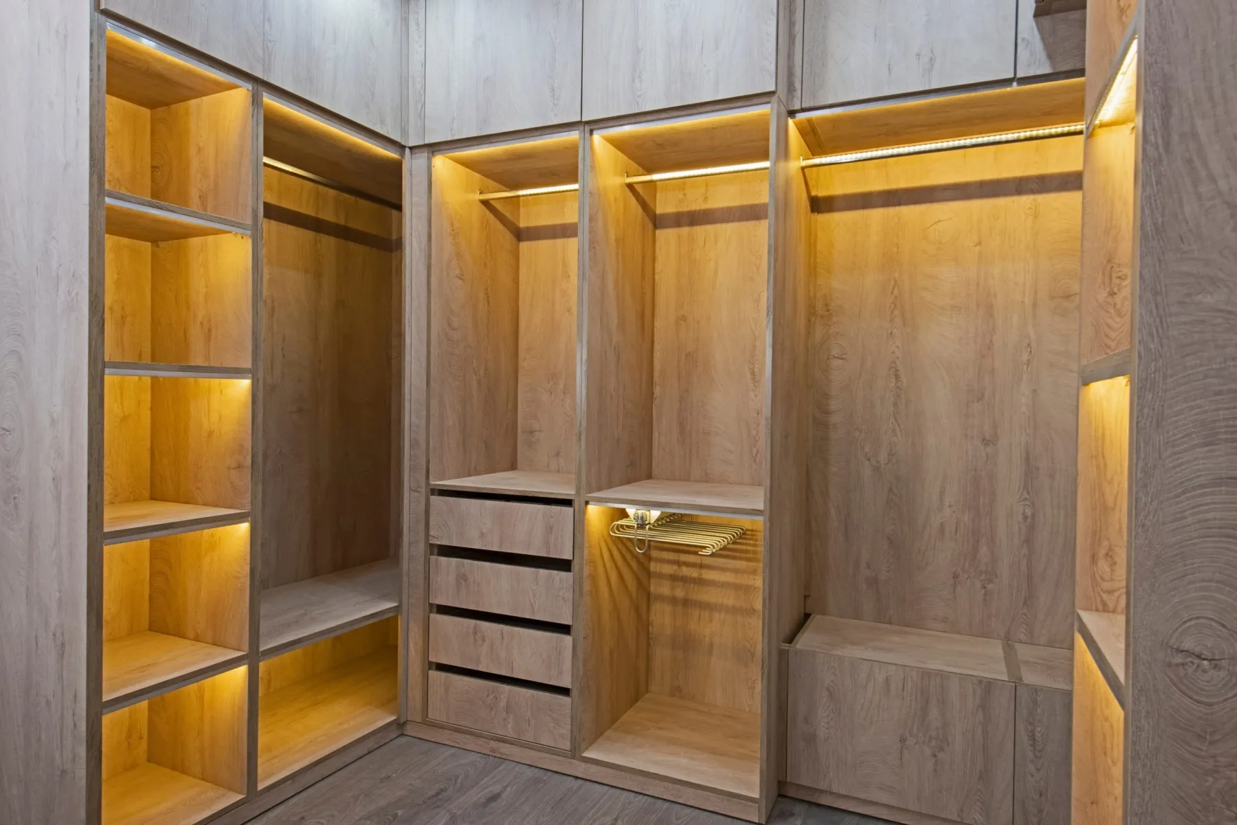 Walk in wardrobe with island unit in a Dubai villa