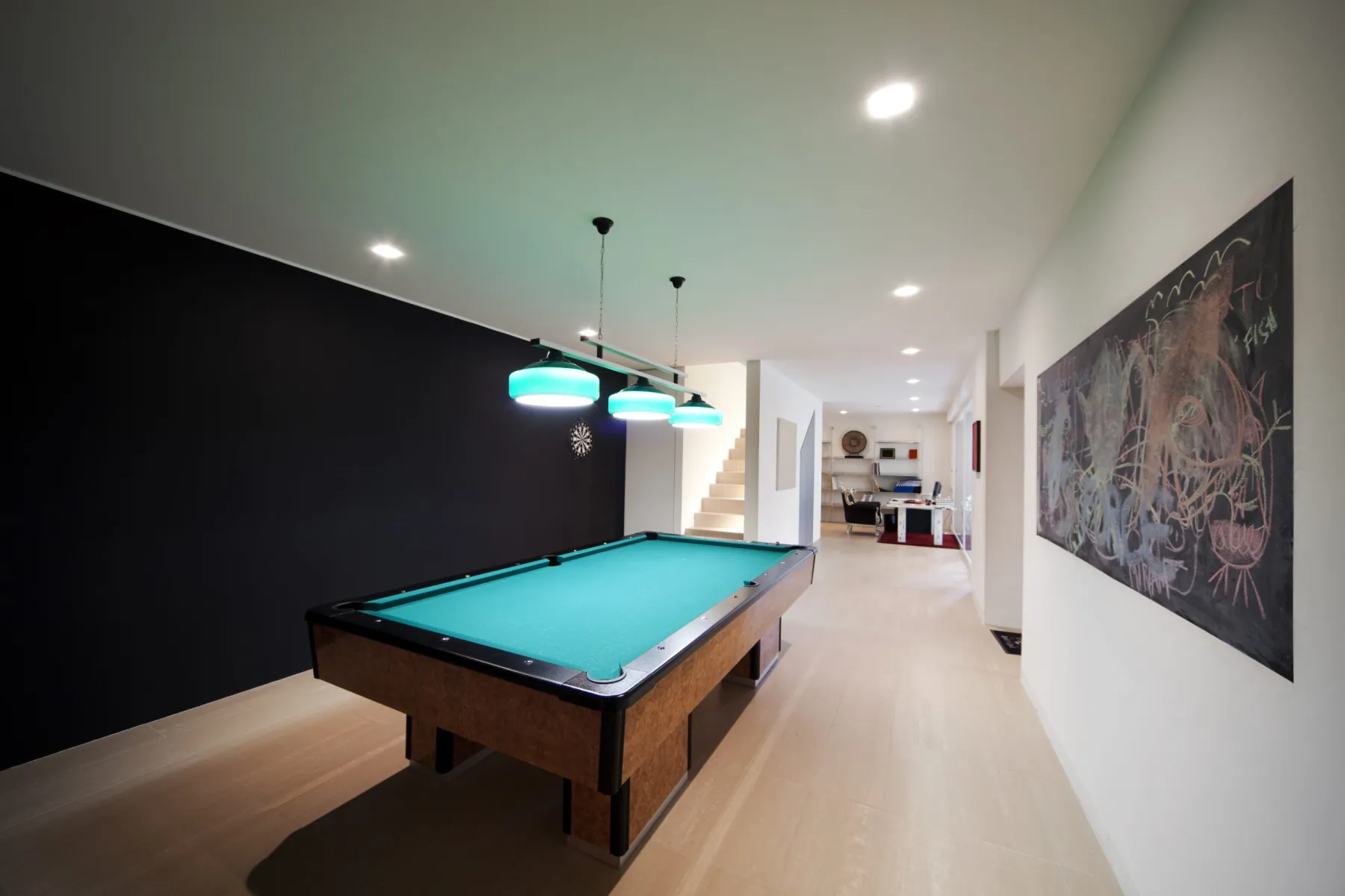 Feature wall painting in a Dubai games room