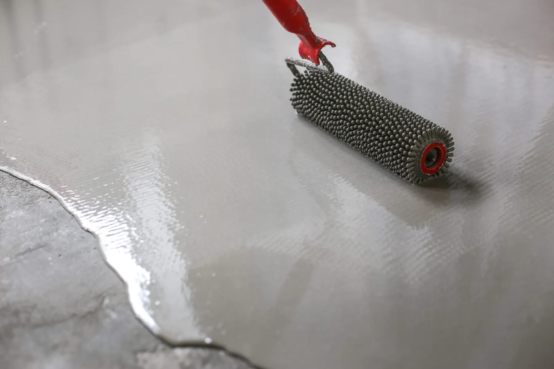 Epoxy floor coating applied in a Dubai garage