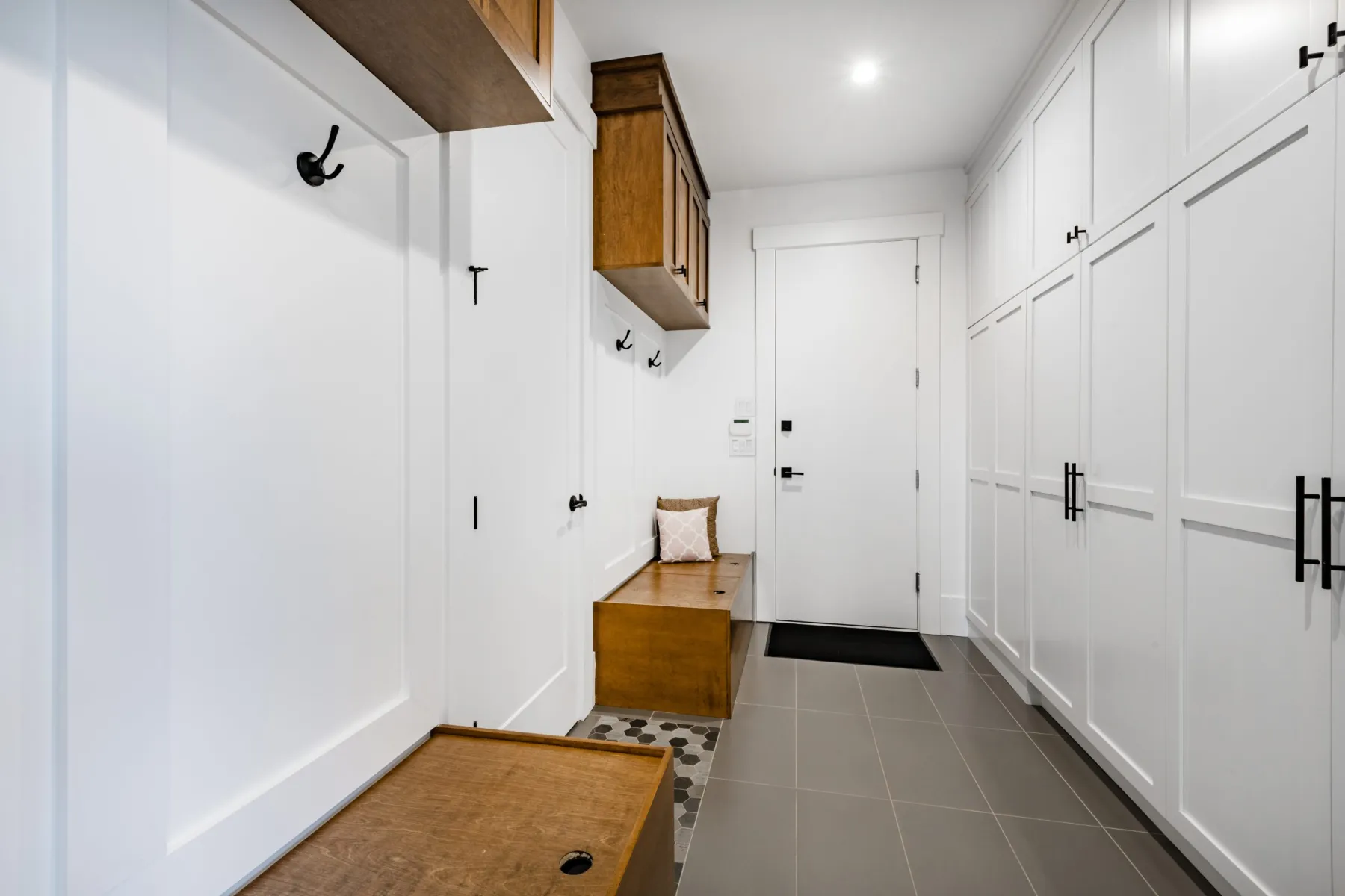Mudroom storage cabinets with integrated seating bench