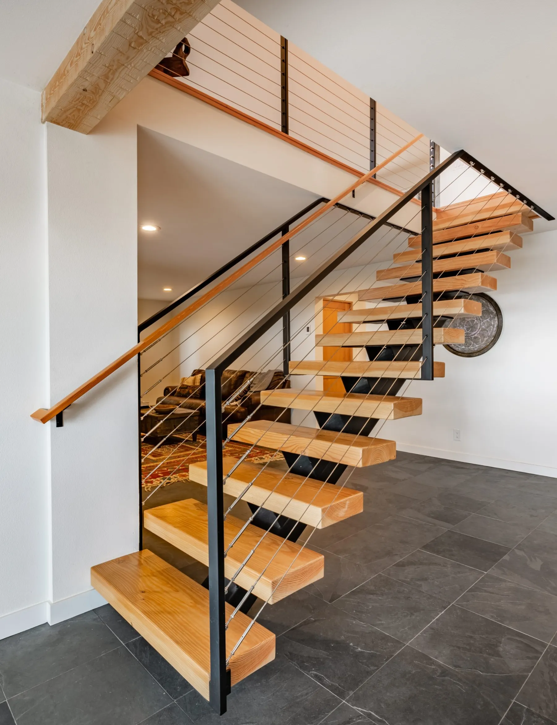 Open riser staircase with glass balustrade