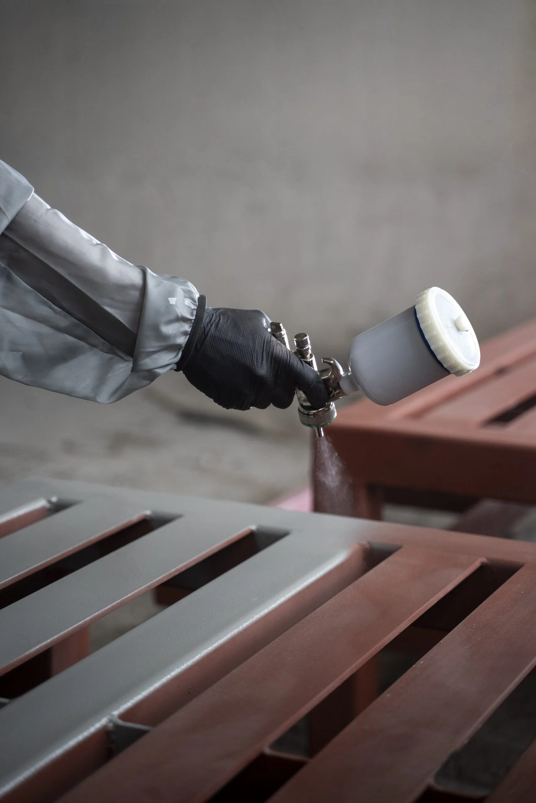 Applying a sprayed finish to a prepared surface