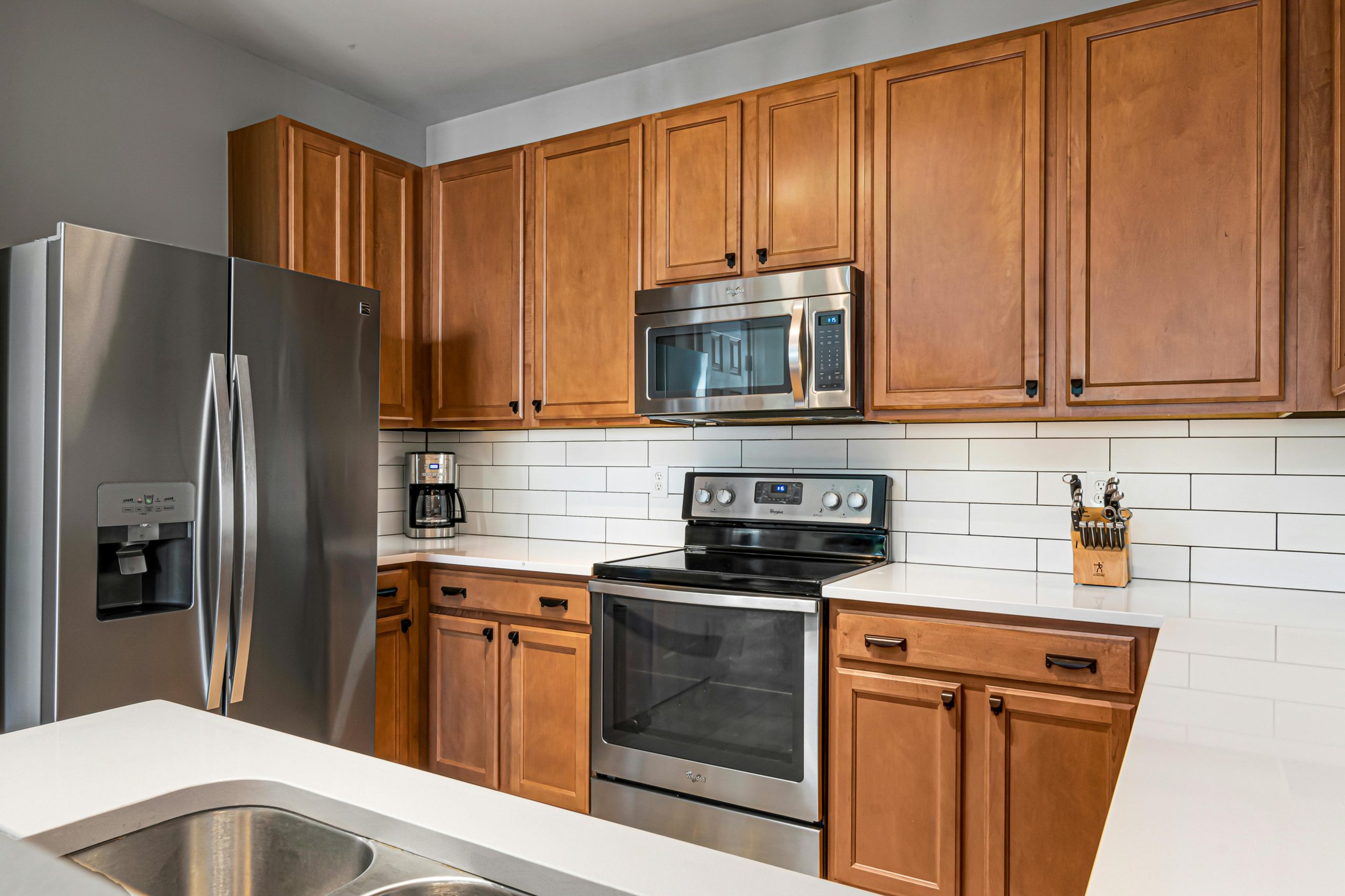 polished farmhouse style kitchen cabinets